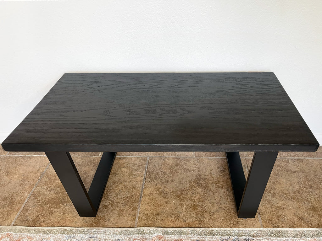 Black wooden bench with black metal U-shape legs 