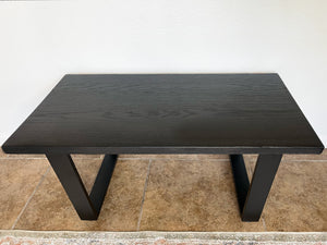 Black wooden bench with black metal U-shape legs 