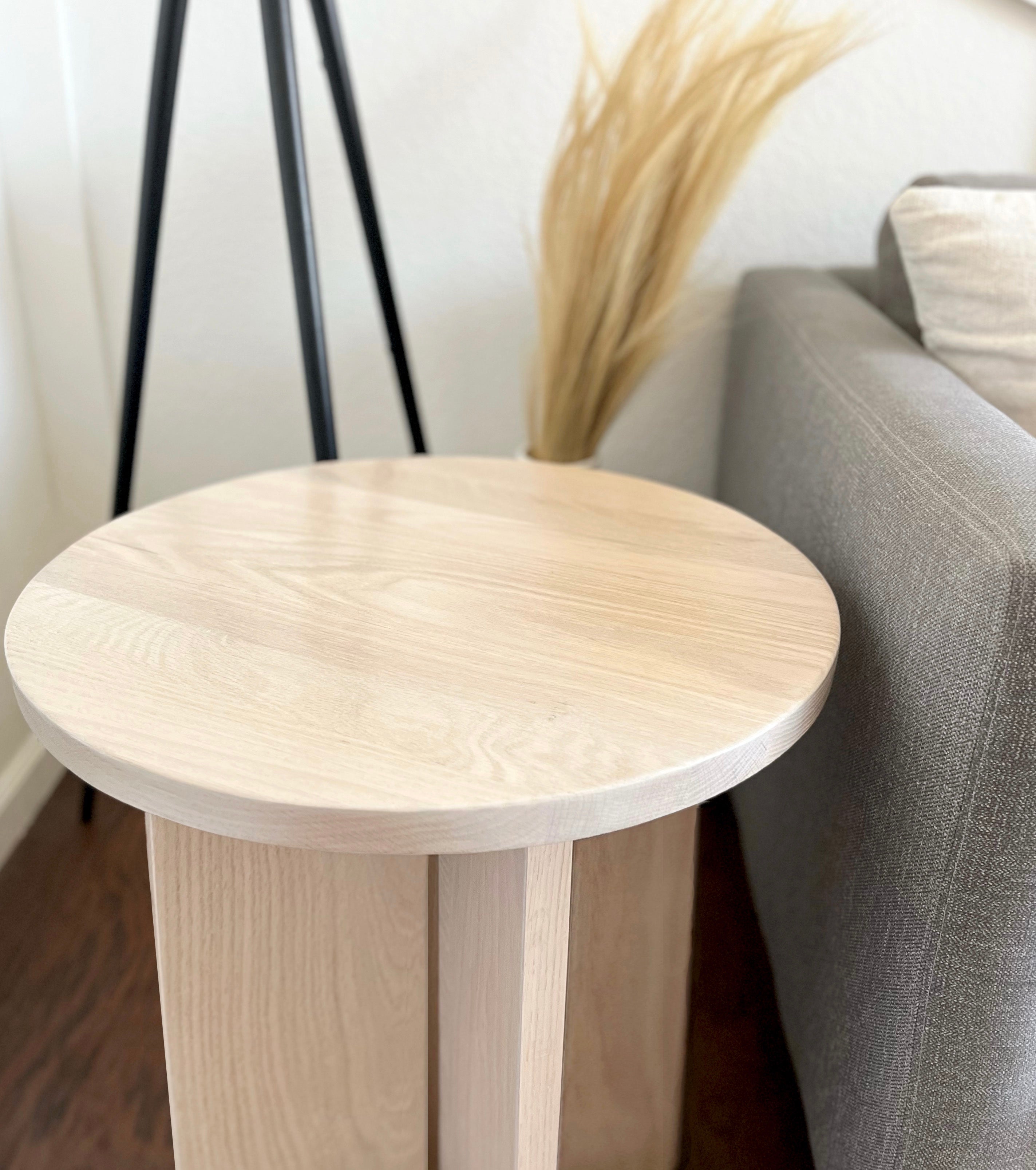 Round oak end table with white finish