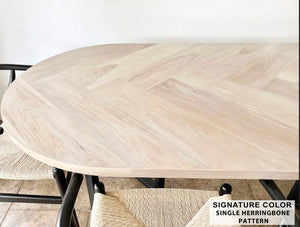 82x42 Custom Shape Oval White Oak Single Herringbone Dining Table - Black Metal Spider Base