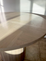Load and play video in Gallery viewer, Round White Oak Wood Pedestal Dining Table, Single or Double Herringbone Top

