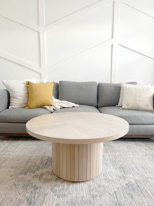 white oak coffee table with pedestal base