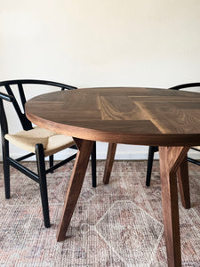 Modern Round Walnut Herringbone Dining Table with Tapered Walnut Wood Legs