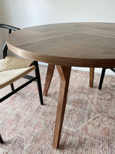 Modern Round Walnut Herringbone Dining Table with Tapered Solid Walnut Wood Legs